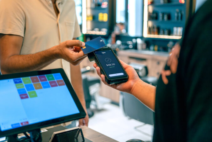 Person tapping the Tyro Pro.