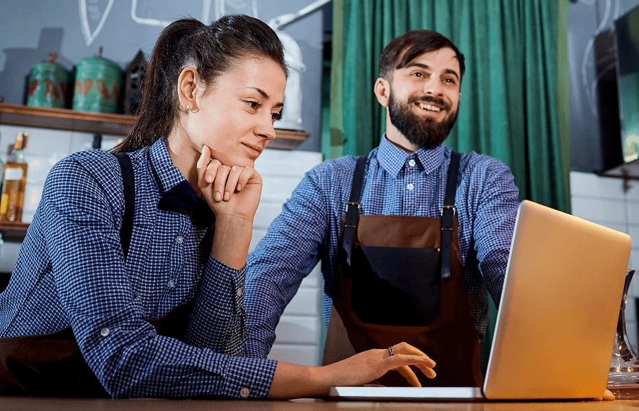 Cafe business owner checking Tyro banking portal