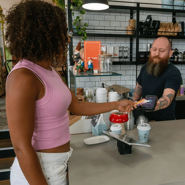 hospitality business owner accepting payment with Tyro