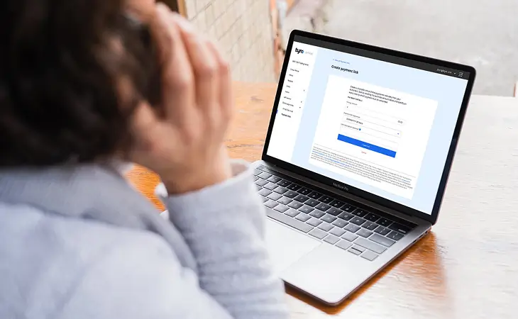 Person on the phone looking at Payment Links screen