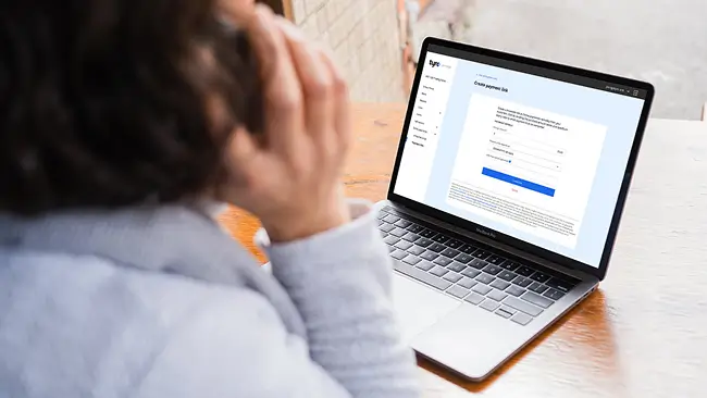 Person on the phone looking at Payment Links screen
