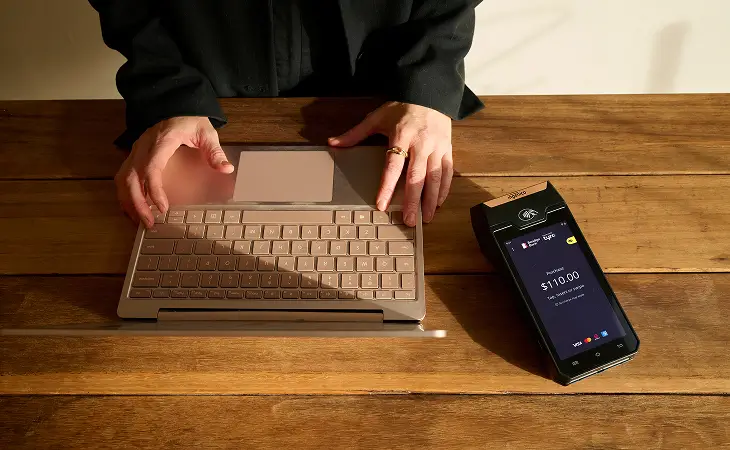 Person on laptop with tyro pro