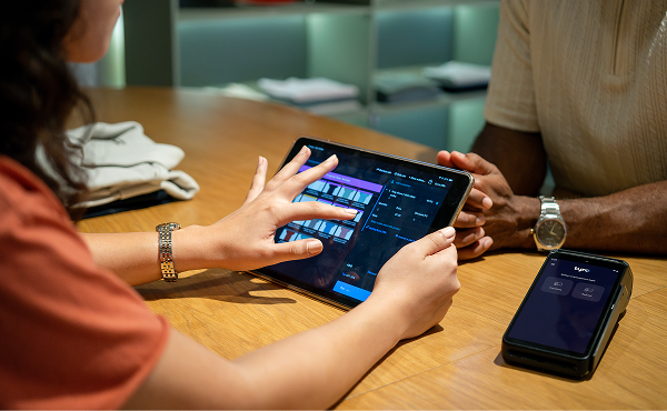 Person tapping on screen