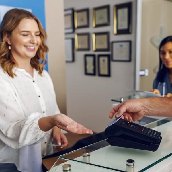 Person tapping in a health clinic