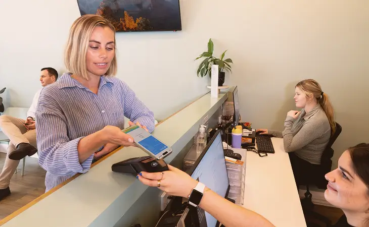 Person tapping a Tyro Pro