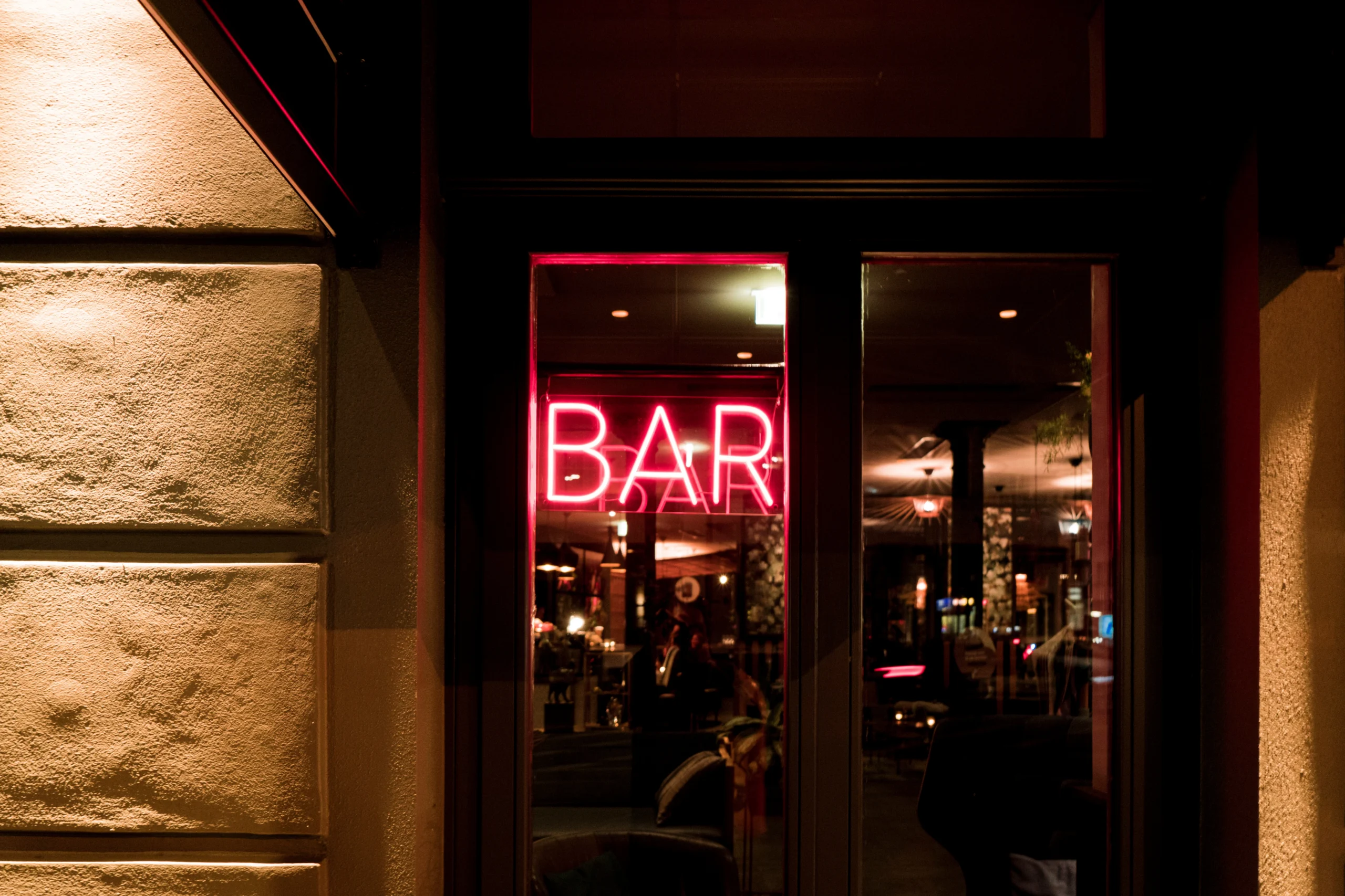 Bar with pink neon light sign