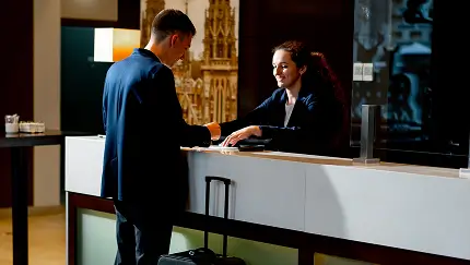 Person checking in to hotel